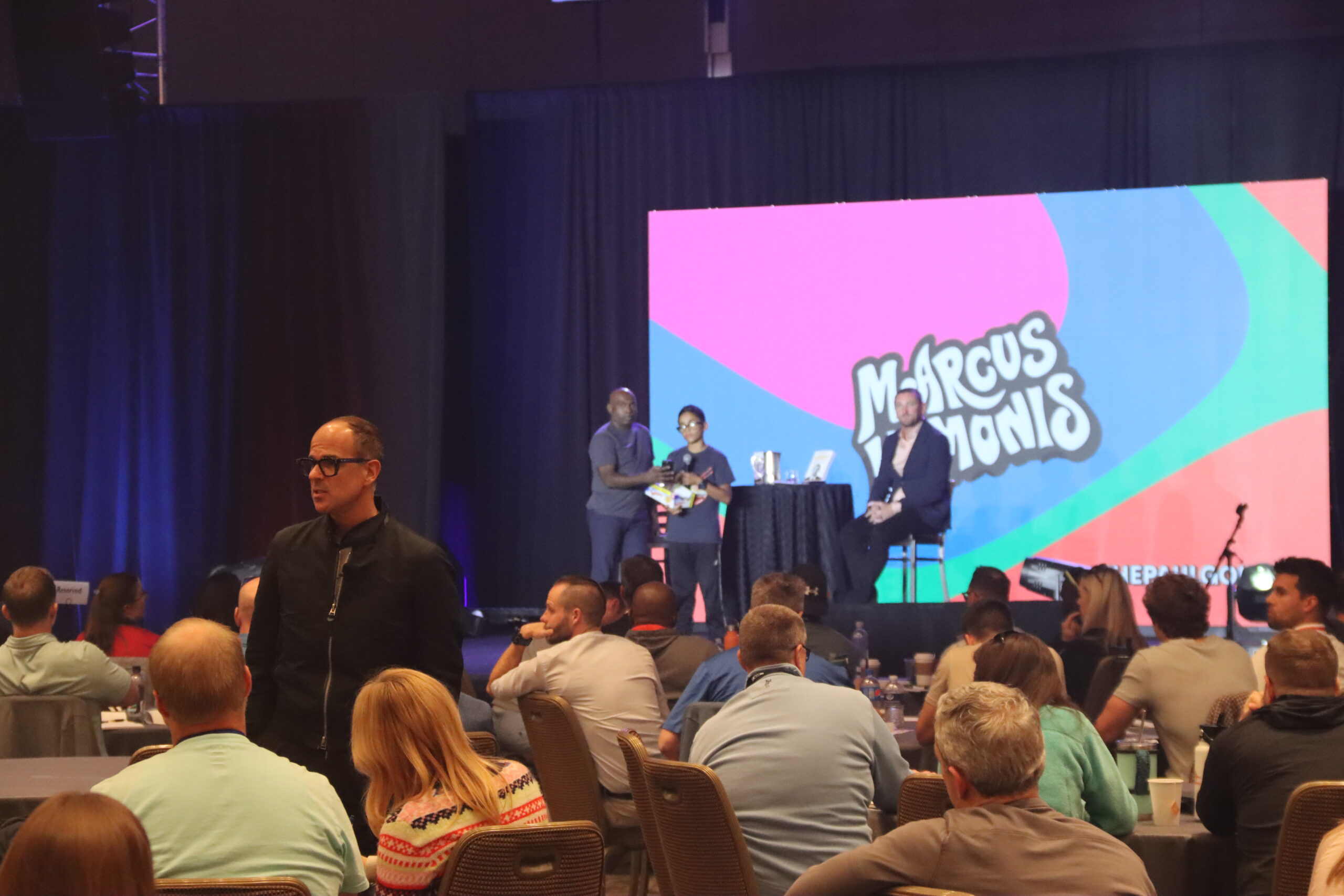 Xavier and Ricky Join Paul on Stage During Marcus Lemonis' Keynote